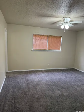 a view of a livingroom with a fan