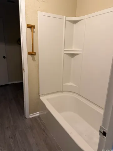 a bathroom with a bathtub
