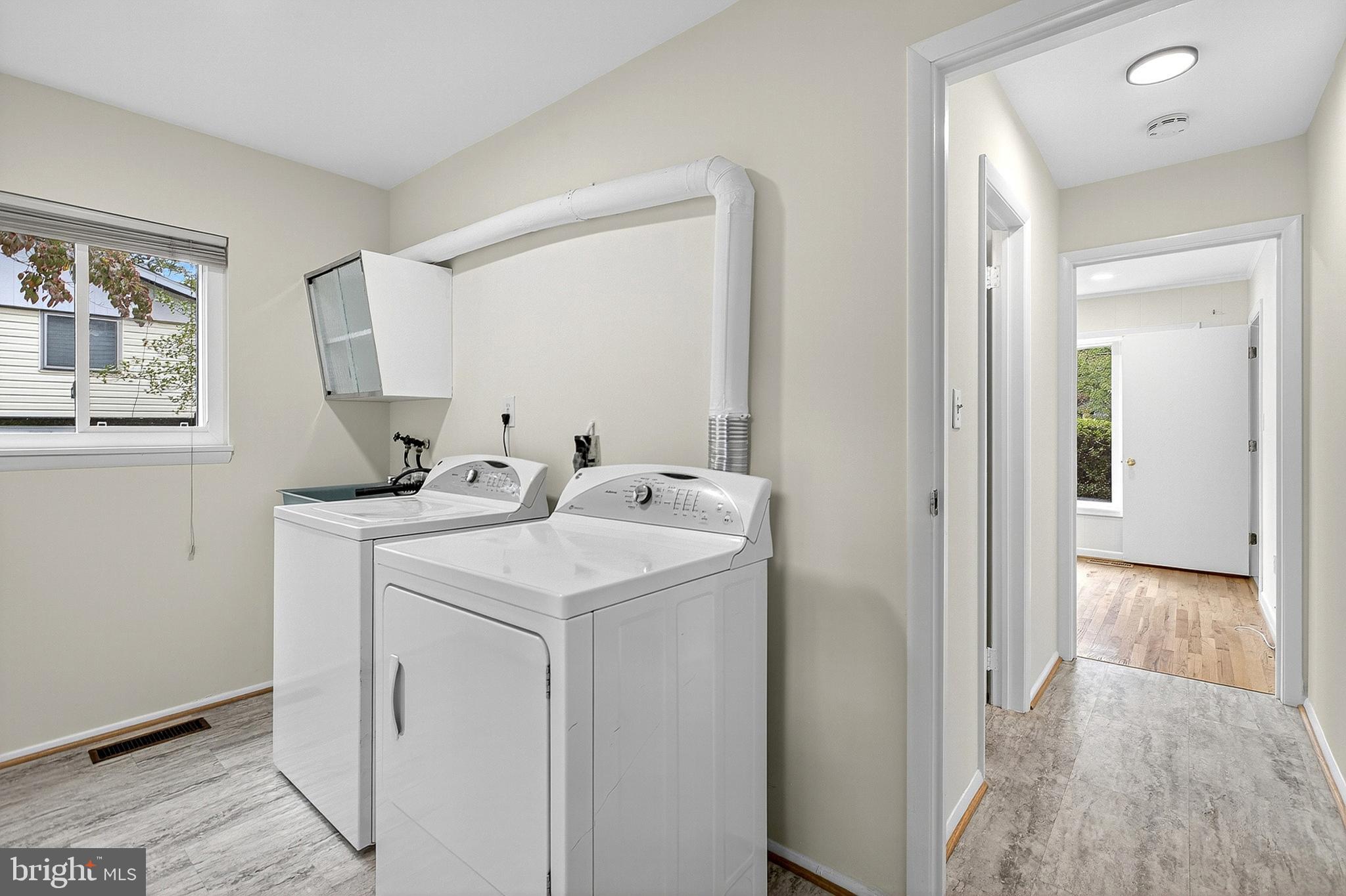 12805 Broadmore Road Silver Spring, MD 20904 - Photo 12 of 48 a utility room with dryer and washer