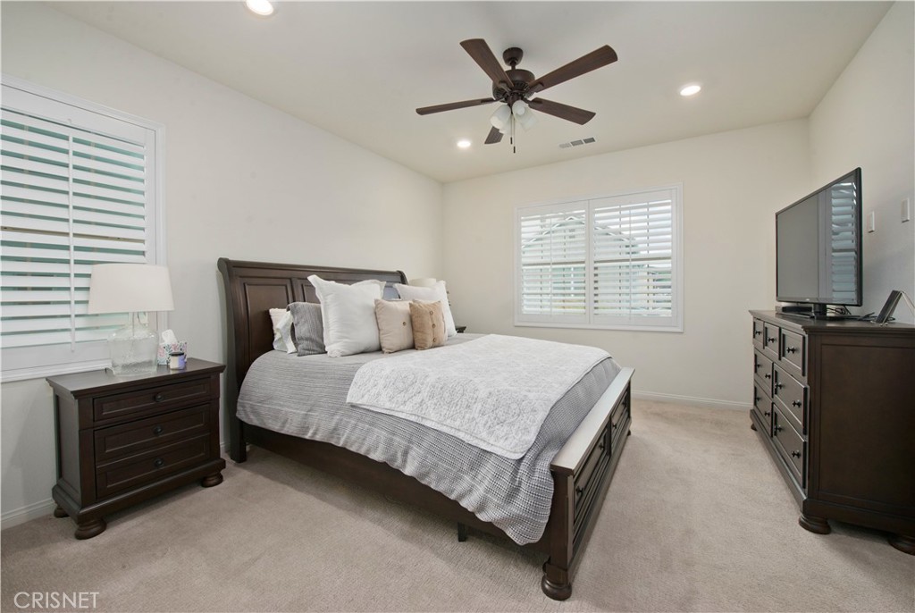 22880 Concord Drive Saugus, CA 91350 - Photo 21 of 34 a bedroom with a bed dresser and a window