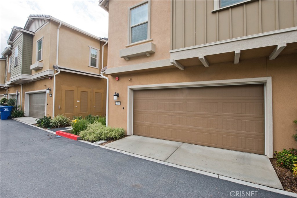 22880 Concord Drive Saugus, CA 91350 - Photo 28 of 34 a front view of a house with garage