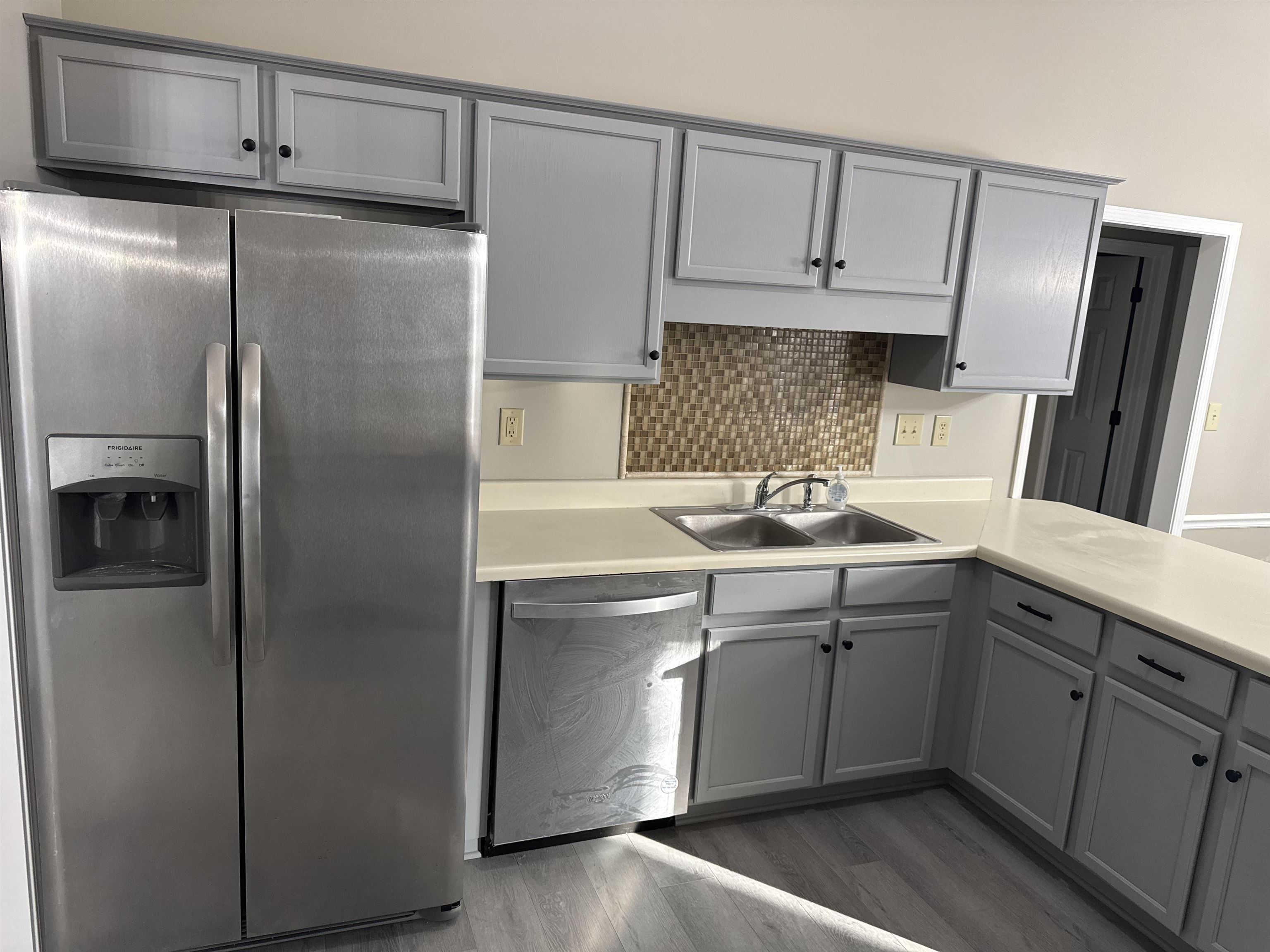 6333 Daybreak Drive Bartlett, TN 38135 - Photo 13 of 21 a kitchen with a sink stainless steel appliances and cabinets