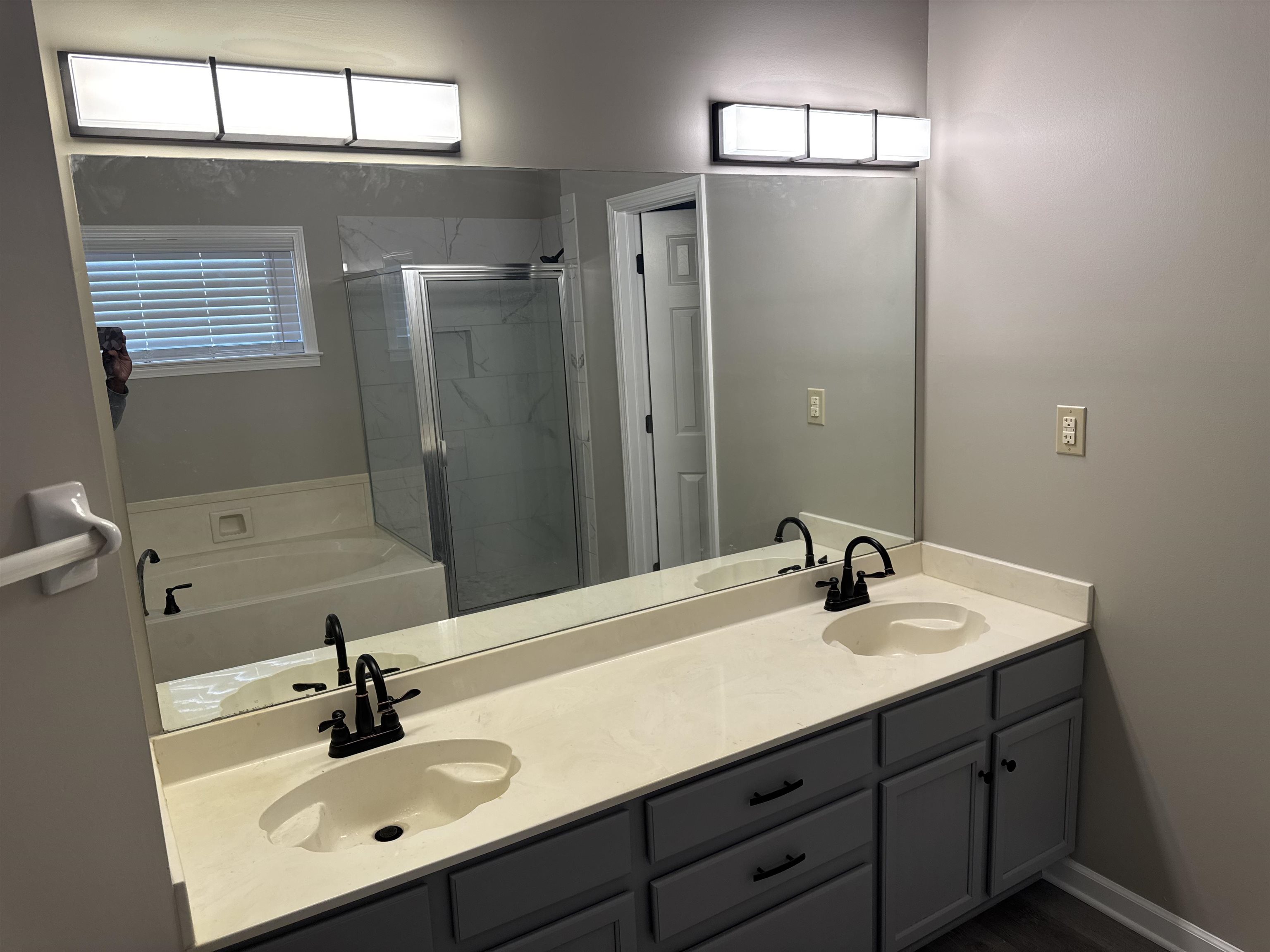 6333 Daybreak Drive Bartlett, TN 38135 - Photo 10 of 21 a bathroom with a sink double vanity and a mirror