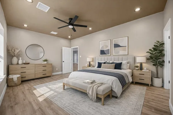 a bed room with a bed mirror and a dresser