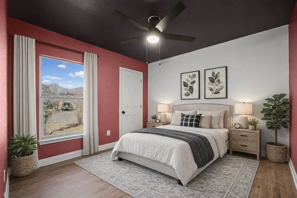 a kitchen with stainless steel appliances a refrigerator sink and white cabinets