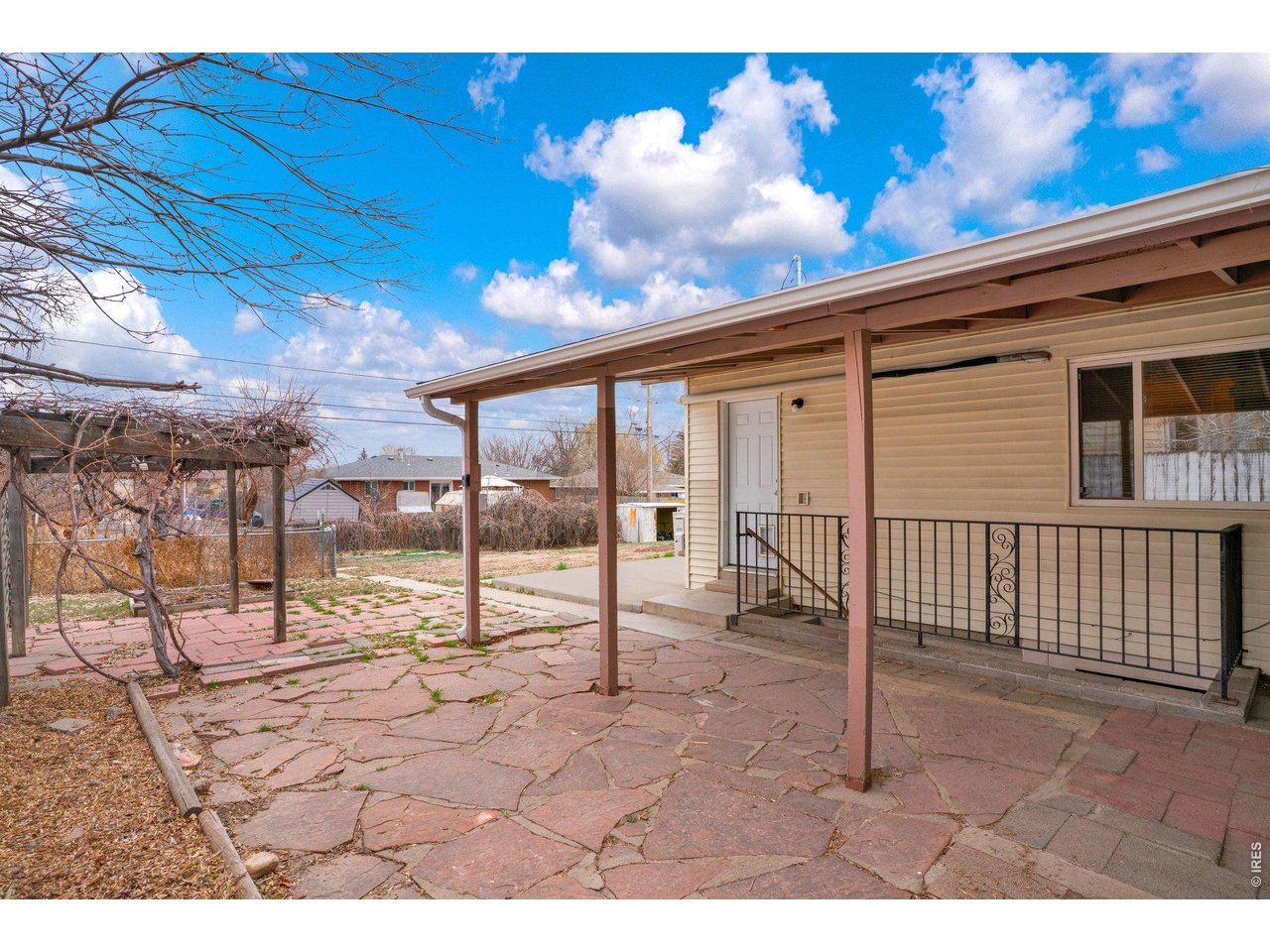 2616 23rd Avenue Greeley, CO 80634 - Photo 16 of 21 a view of a porch with a backyard