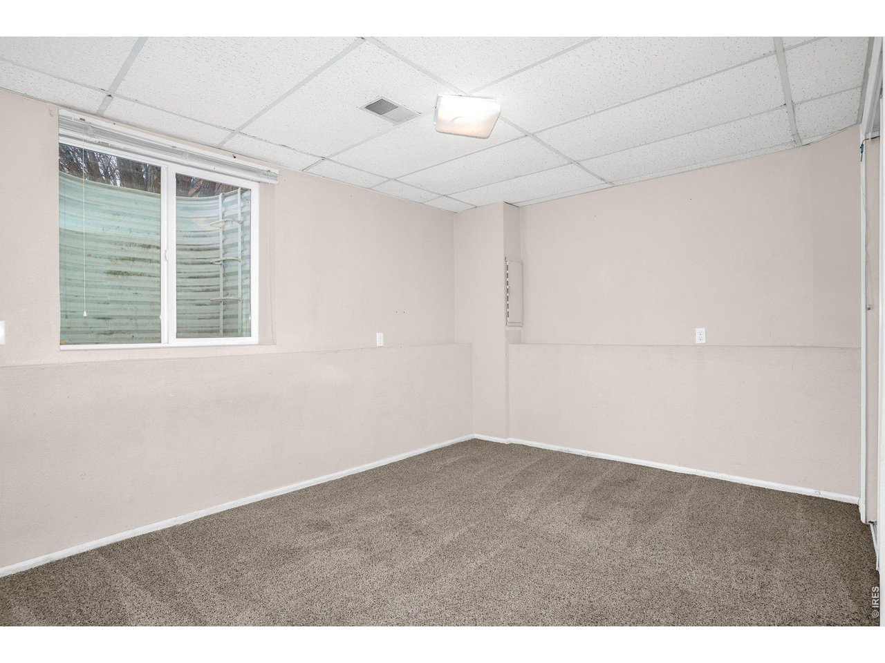 2616 23rd Avenue Greeley, CO 80634 - Photo 20 of 21 a view of an empty room with a window