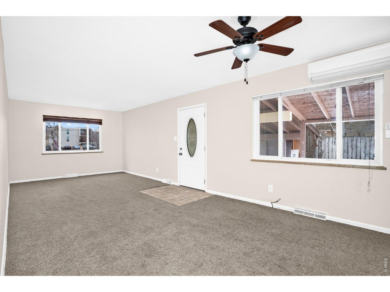 2616 23rd Avenue Greeley, CO 80634 - Photo 6 of 21 a view of an empty room with a window