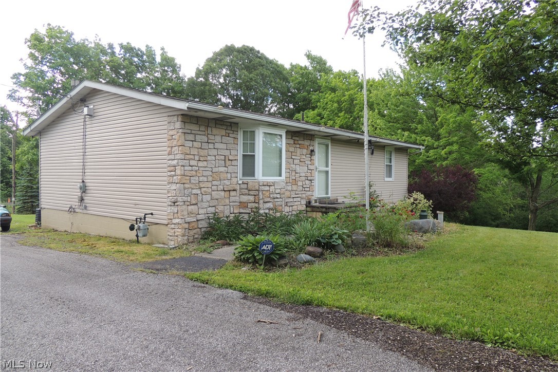 11550 Chamberlain Road Mantua, OH 44255 - Photo 2 of 24 The front of the home from the driveway.