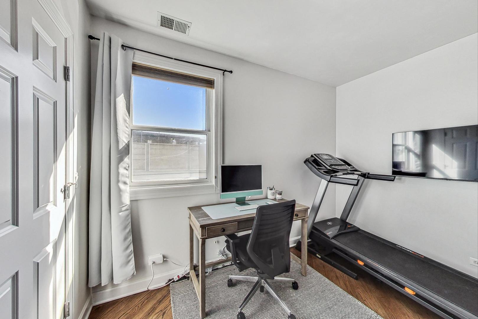 951 West Fletcher Street, Unit 2 Chicago, IL 60657 - Photo 18 of 26 a view of a workspace with furniture and a window