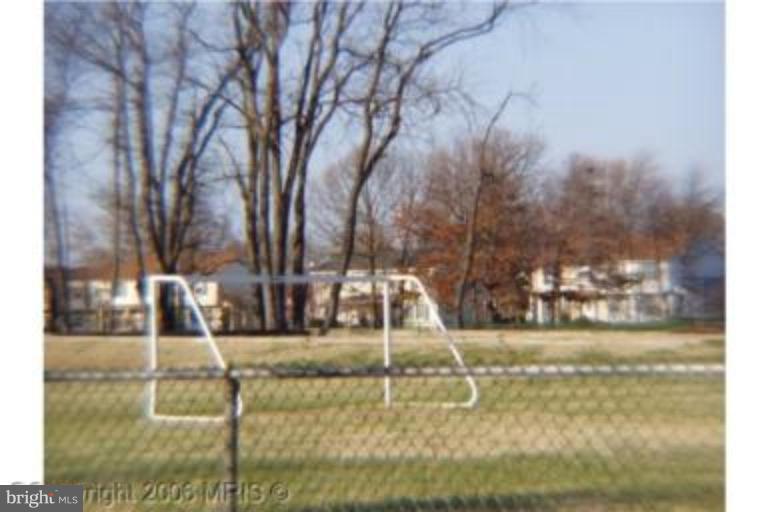 8575 Beacon Point Road Pasadena, MD 21122 - Photo 5 of 13 a view of a lake view