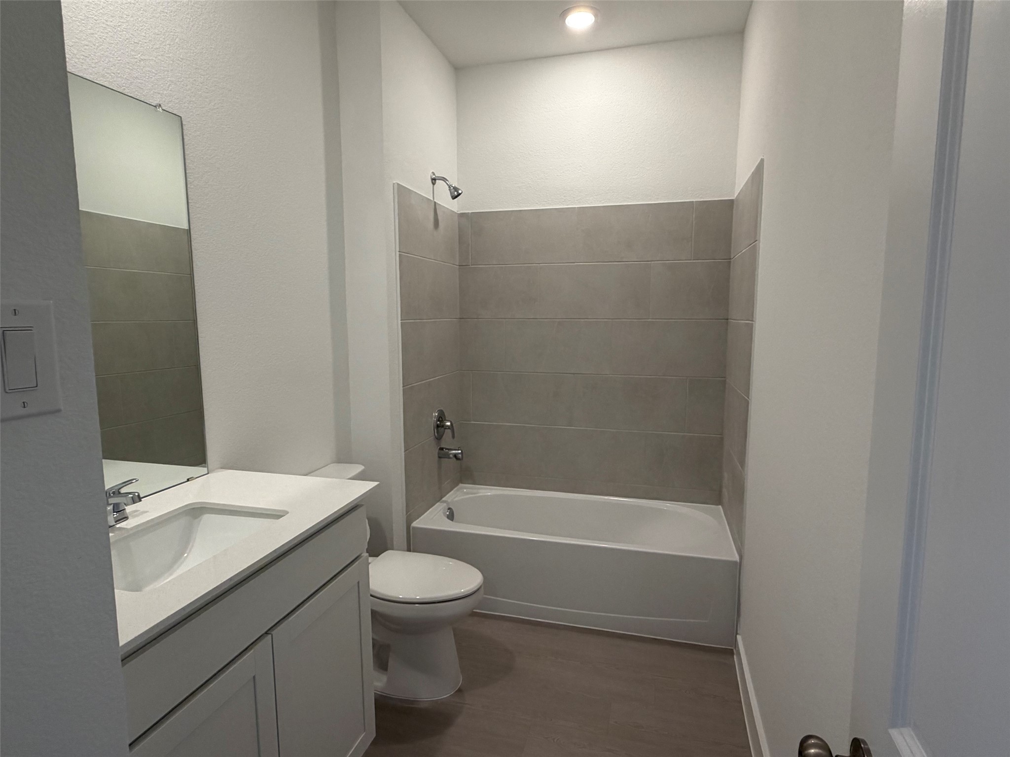 2514 Rose Gold Drive Rosharon, TX 77583 - Photo 20 of 27 a bathroom with a granite countertop bathtub shower sink vanity and toilet