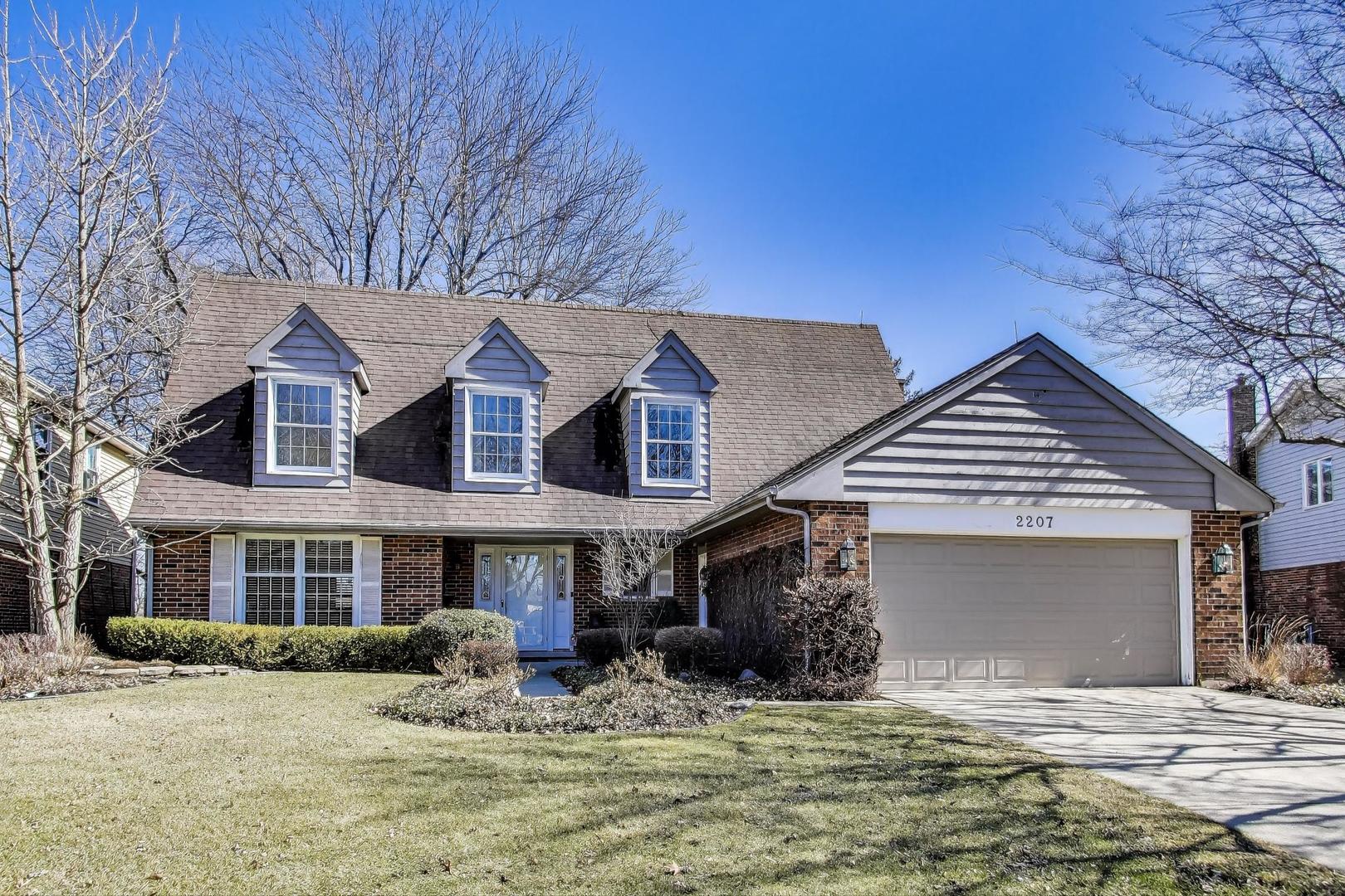 2207 North Brighton Place Arlington Heights, IL 60004 - Photo 1 of 37 a front view of a house with a yard outdoor seating and yard