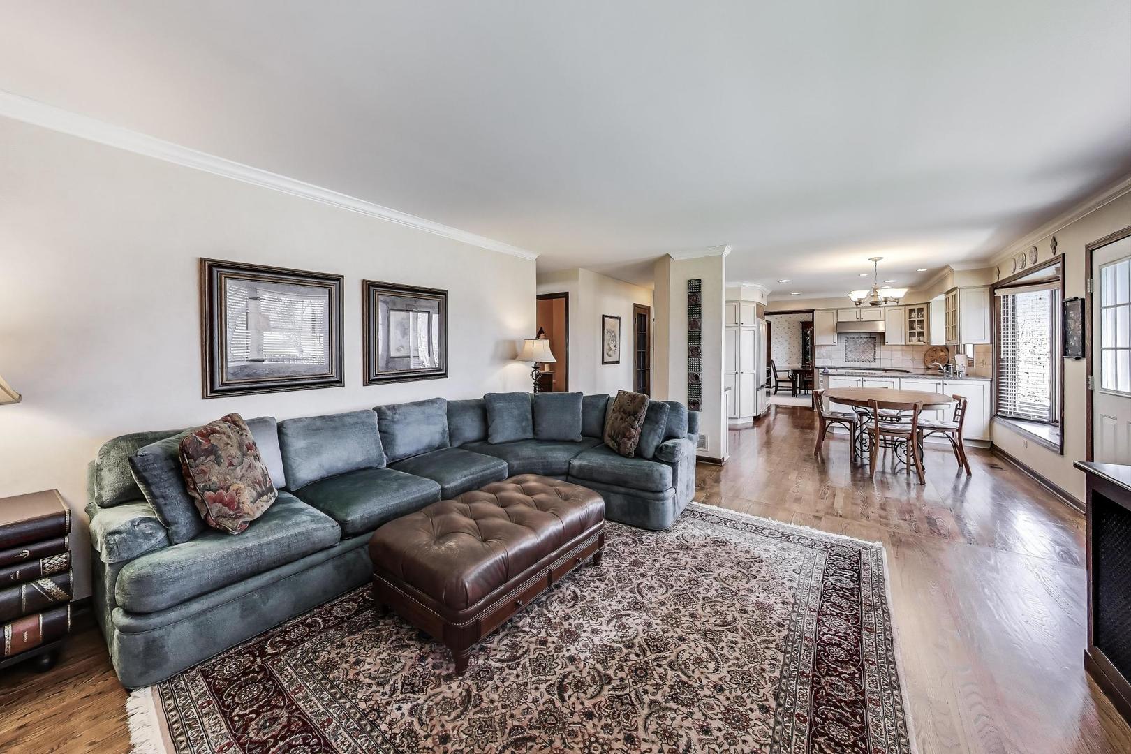2207 North Brighton Place Arlington Heights, IL 60004 - Photo 13 of 37 a living room with furniture wooden floor and a table
