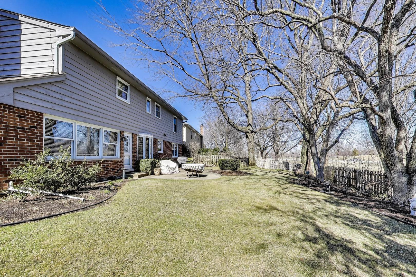 2207 North Brighton Place Arlington Heights, IL 60004 - Photo 31 of 37 a view of a yard with a house and sitting area
