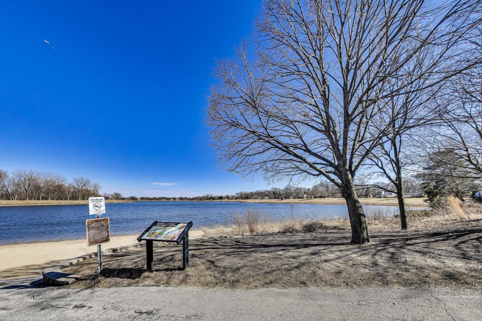 2207 North Brighton Place Arlington Heights, IL 60004 - Photo 37 of 37 a view of a lake with a yard