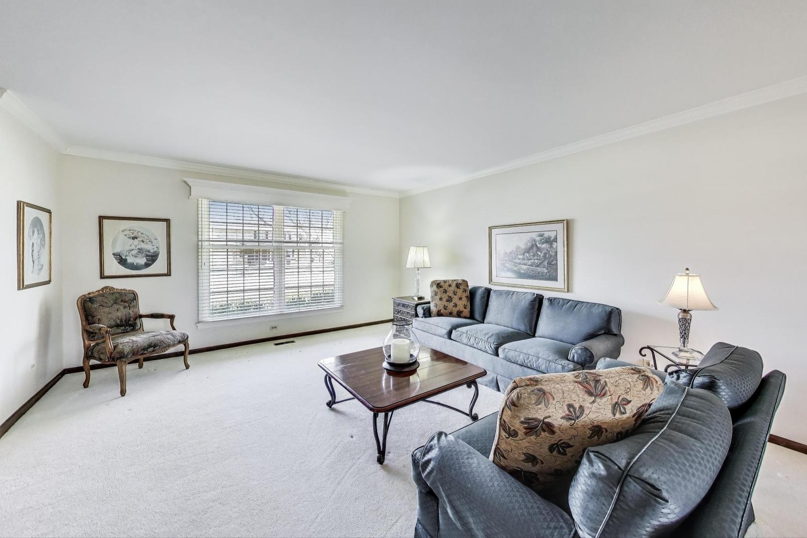 2207 North Brighton Place Arlington Heights, IL 60004 - Photo 4 of 37 a living room with furniture and a window