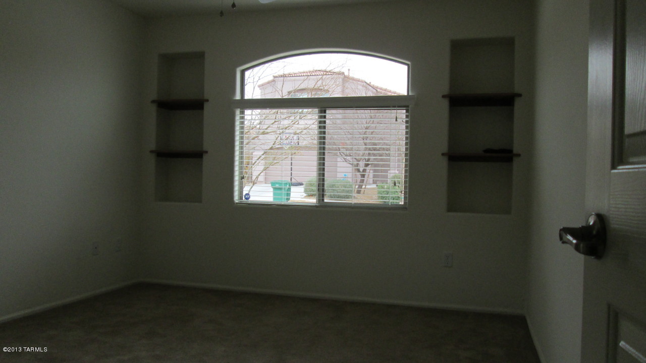 10855 East New Rock Ridge Drive Vail, AZ 85641 - Photo 22 of 34 an empty room with a window