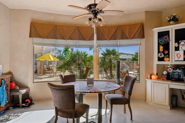a kitchen with stainless steel appliances granite countertop a stove and a refrigerator