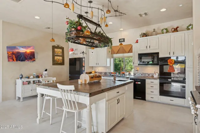 a room with furniture a rug and a window