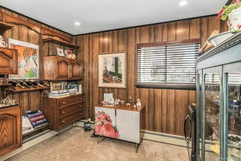 a view of room with window and ceiling fan