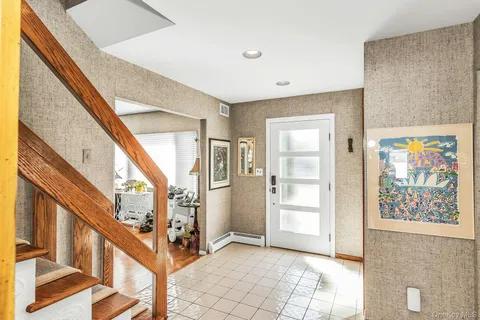 a view of an entryway with seating area