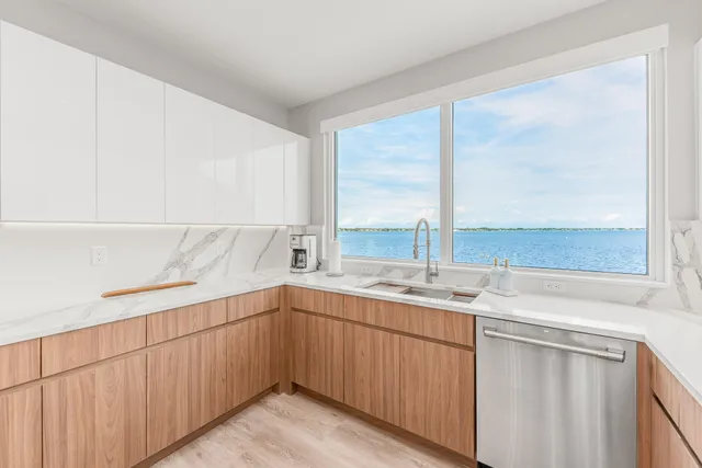 a kitchen with a sink and a window