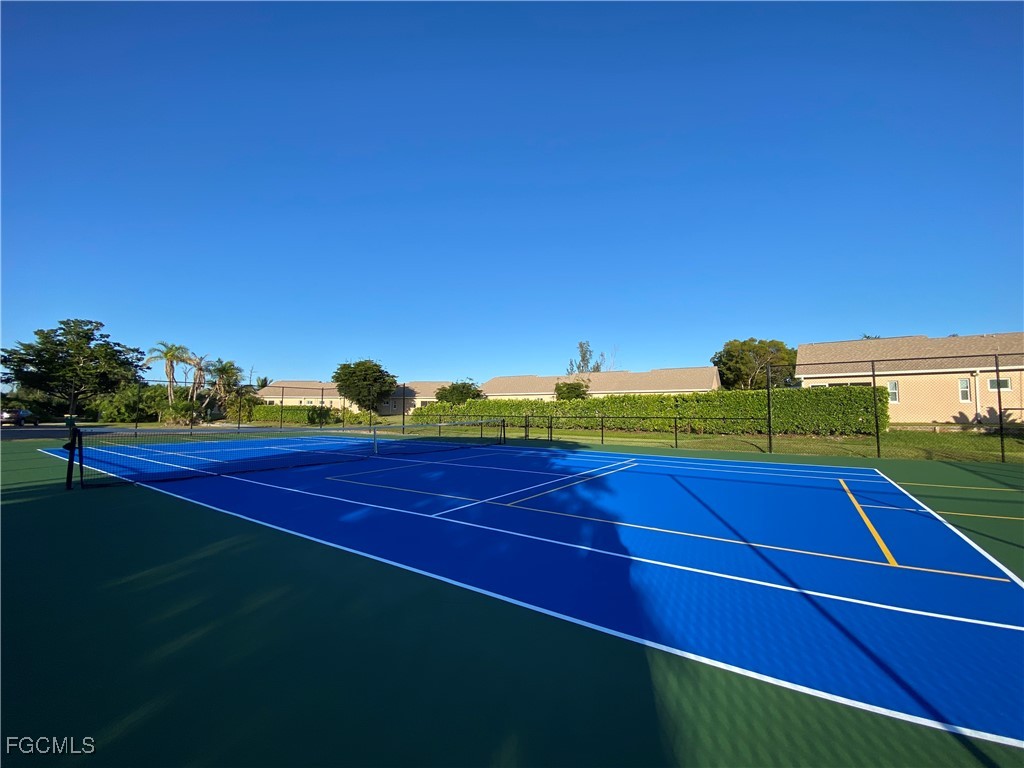 16881 Davis Road, Unit 412 Fort Myers, FL 33908 - Photo 4 of 27 a view of an outdoor space and tennis court