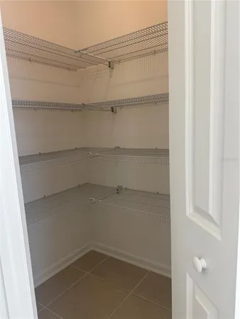 a view of an empty walk in closet