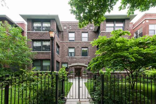 4441 North Beacon Street, Unit 3A Chicago, IL 60640 - Photo 1 of 1 a front view of a house with a garden
