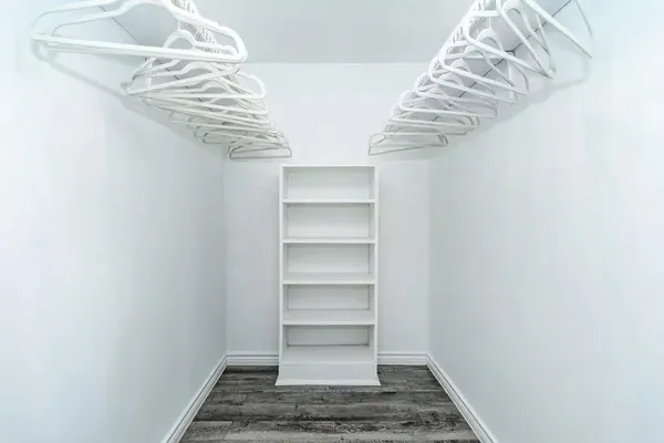 a view of a room with rack on the wall