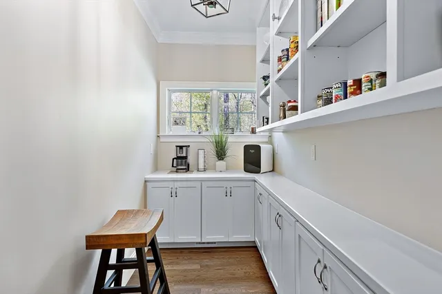 a kitchen with stainless steel appliances a sink and a refrigerator