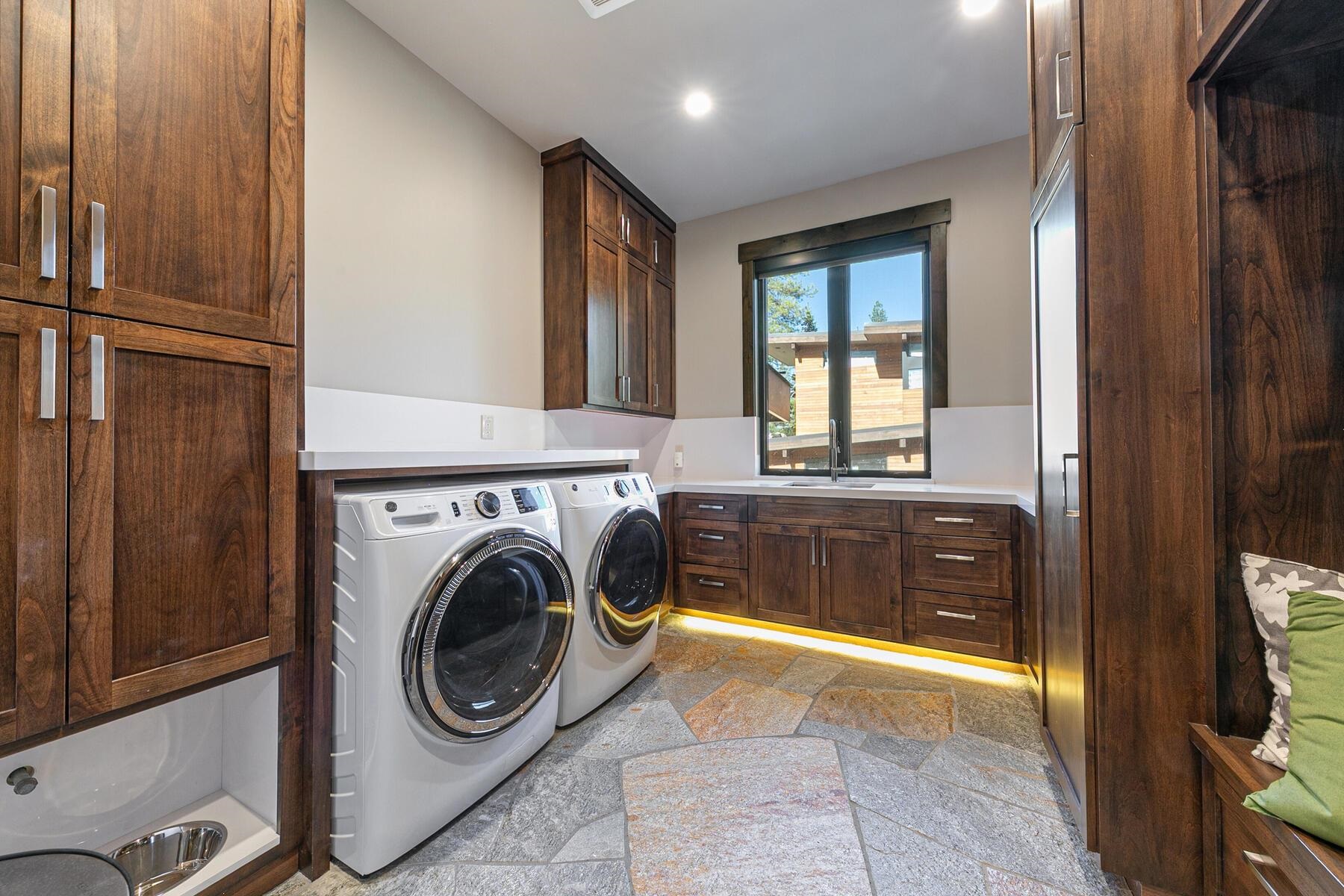 10645 Carson Range Road Truckee, CA 96161 - Photo 18 of 28 a view of a hallway with washer and dryer