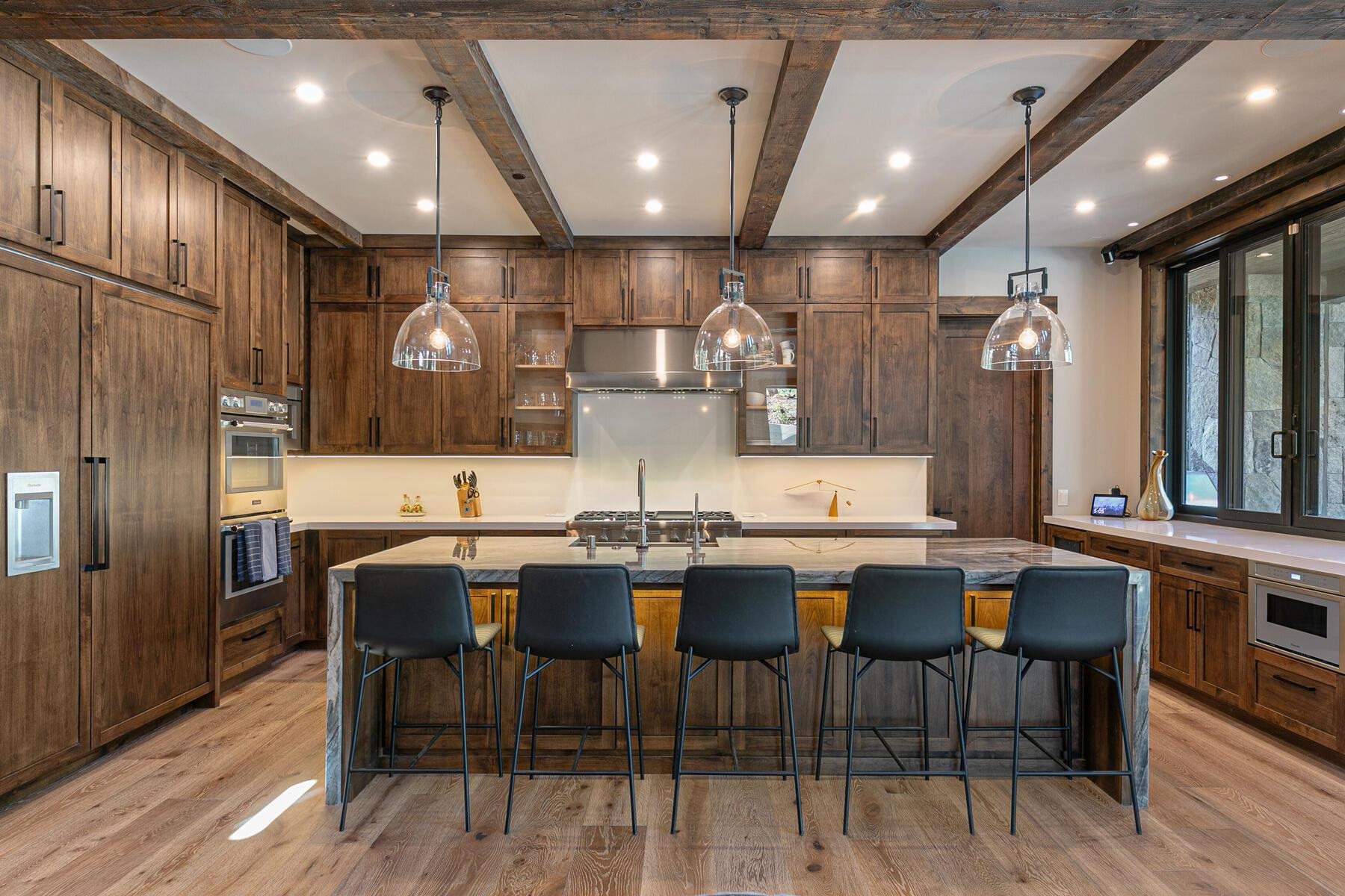 10645 Carson Range Road Truckee, CA 96161 - Photo 6 of 28 a kitchen with a table and chairs in it