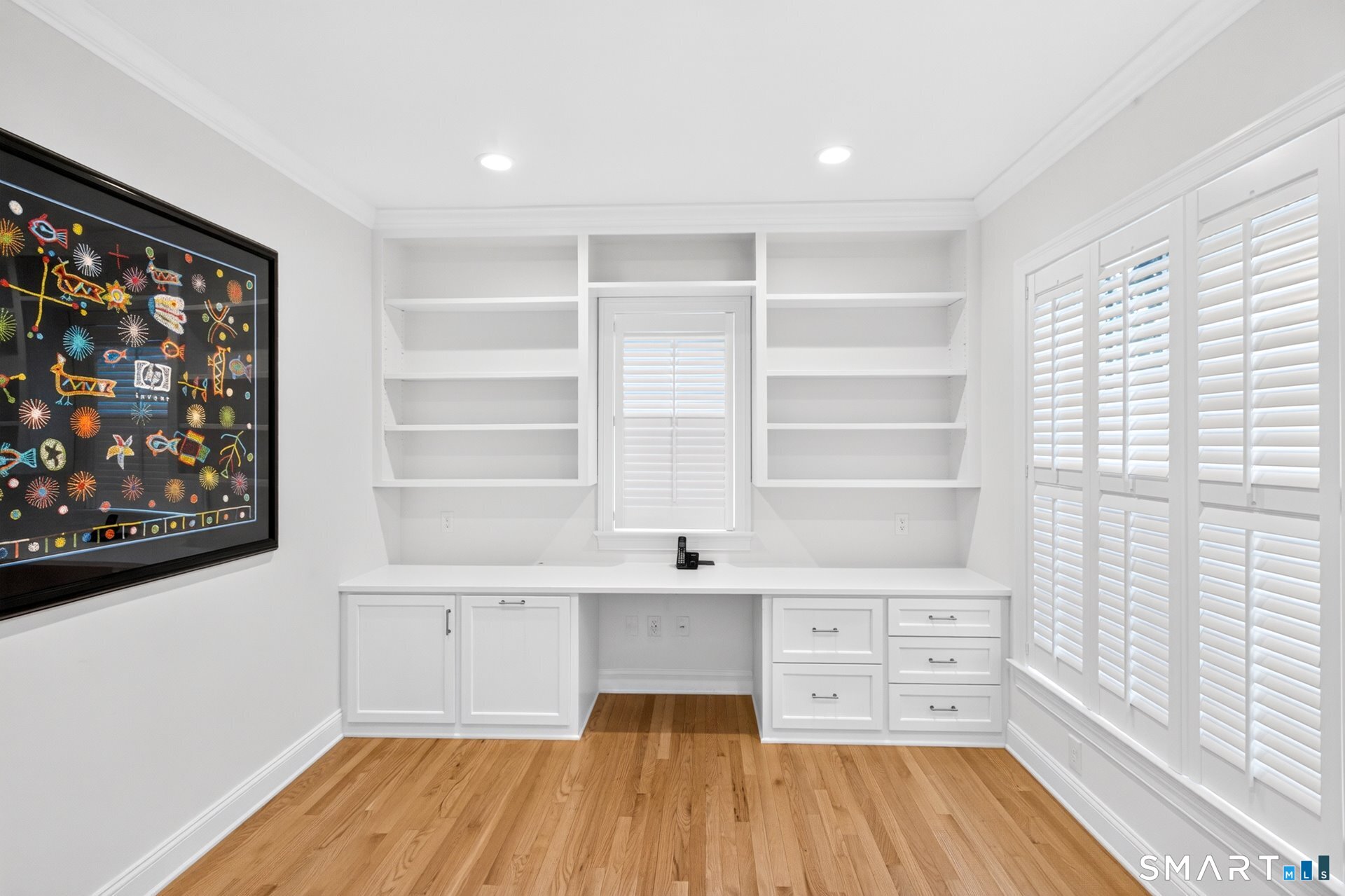 6 Prospect Ridge, Unit 6 Simsbury, CT 06070 - Photo 24 of 33 A built-in desk area plus a set of plantation shutters which you will see through out the home