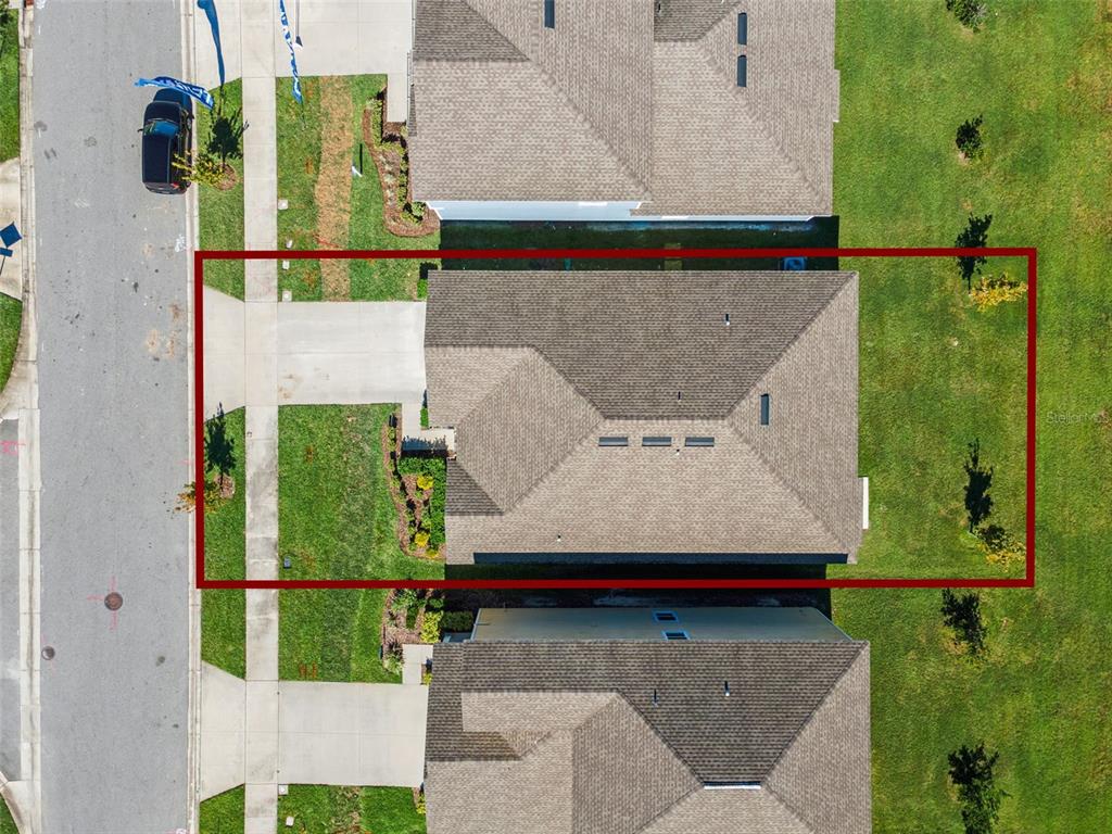2011 Myrtle Pine Street Kissimmee, FL 34746 - Photo 3 of 28 an aerial view of a house with a swimming pool