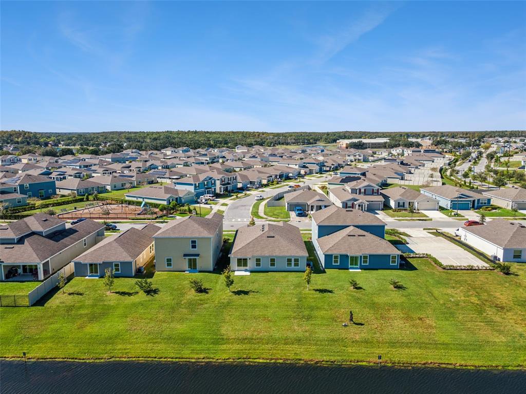 2011 Myrtle Pine Street Kissimmee, FL 34746 - Photo 4 of 28 an aerial view of residential houses with outdoor space