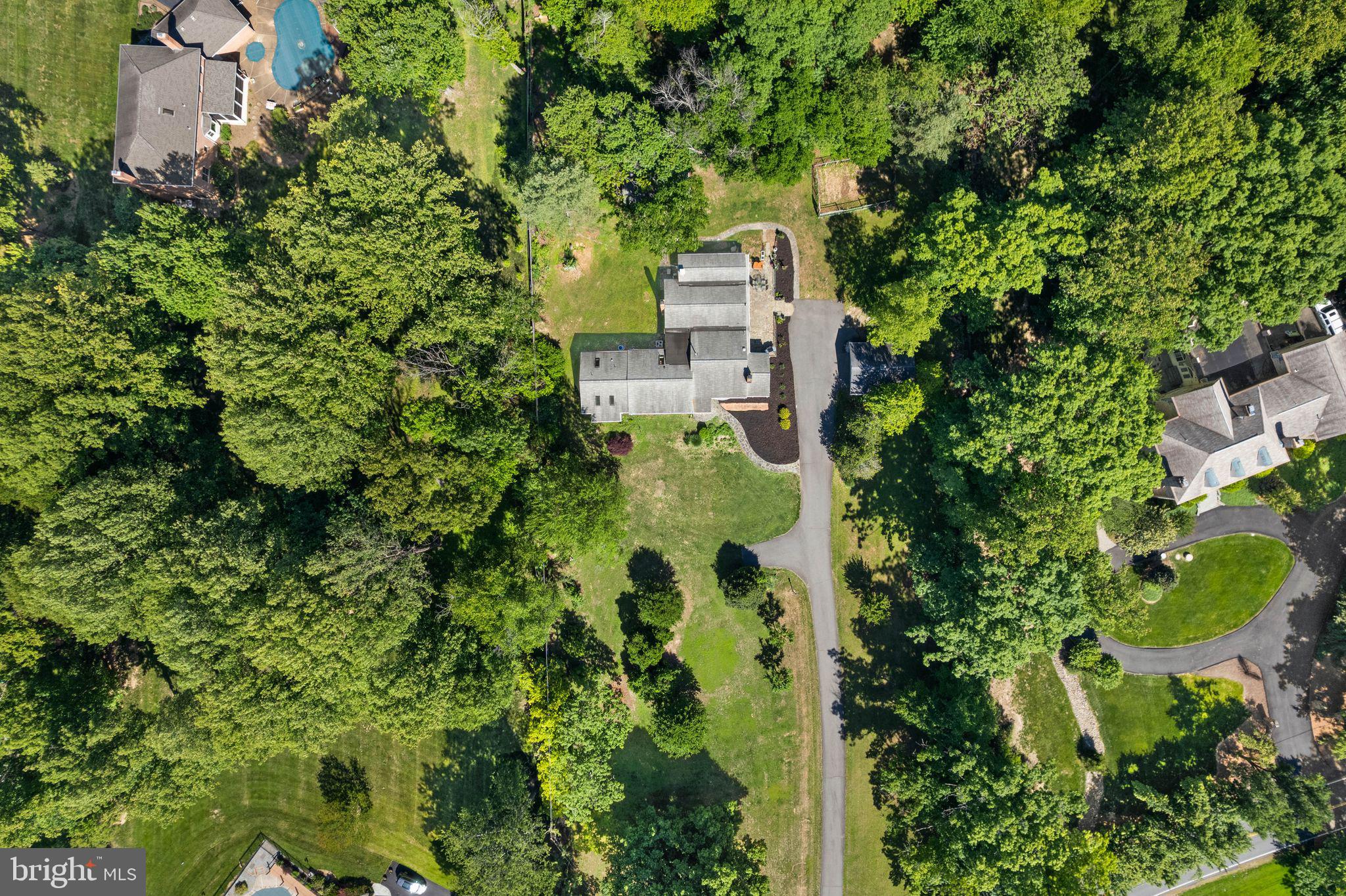 815 Seneca Road Great Falls, VA 22066 - Photo 56 of 61 an aerial view of a house with a yard