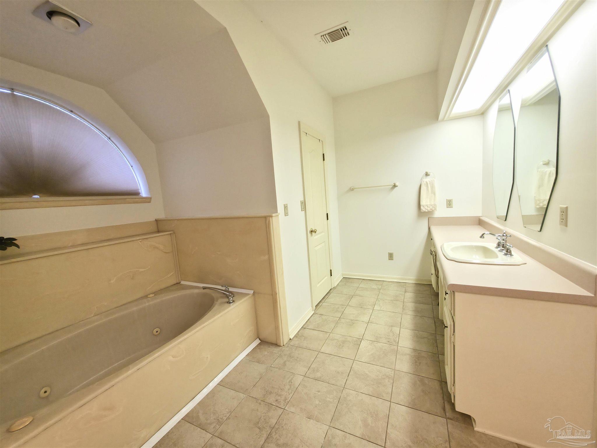 3249 Windmill Circle Cantonment, FL 32533 - Photo 31 of 44 a bathroom with a sink a toilet and shower