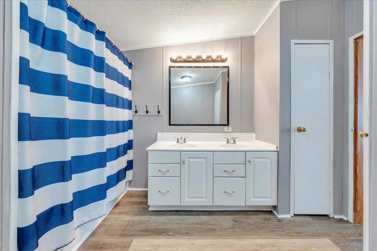5452 Haw Patch Road Ferrum, VA 24088 - Photo 27 of 35 a bathroom with a sink and a mirror