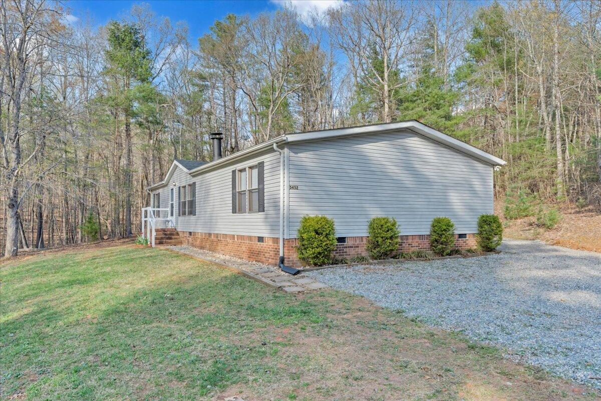 5452 Haw Patch Road Ferrum, VA 24088 - Photo 33 of 35 a view of a house with backyard