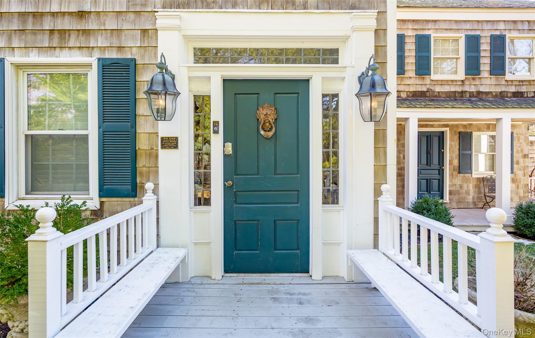 78 Mecox Road Water Mill, NY 11976 - Photo 2 of 41 a view of a brick house with glass windows