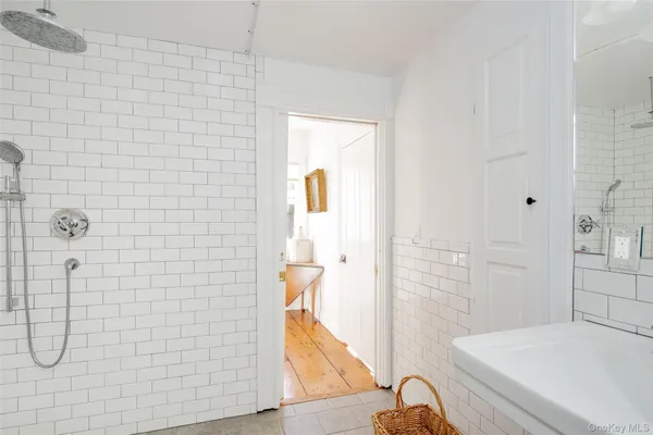 a view of an entryway with wooden floor and stairs