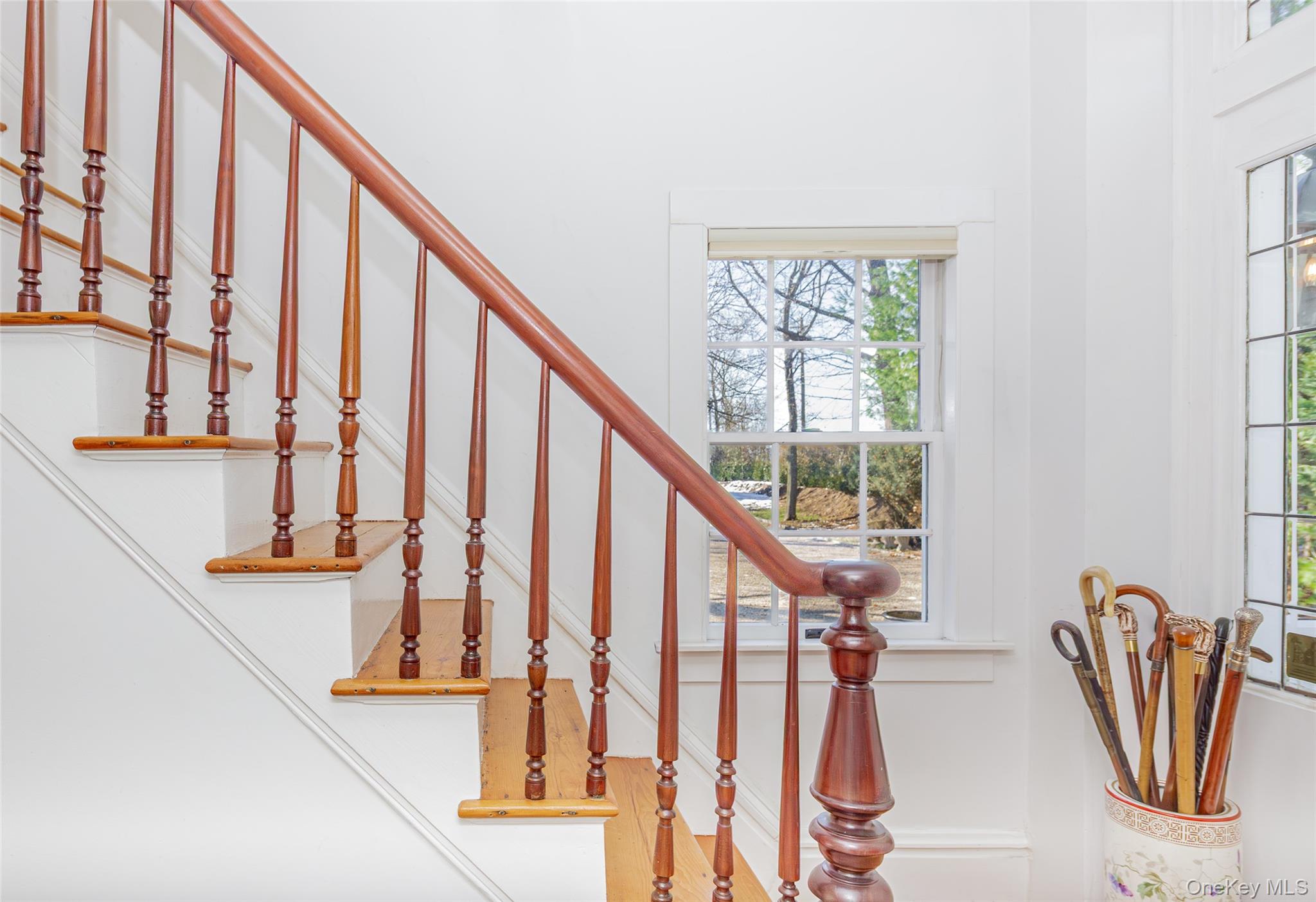 78 Mecox Road Water Mill, NY 11976 - Photo 25 of 41 a view of an entryway with wooden floor and stairs