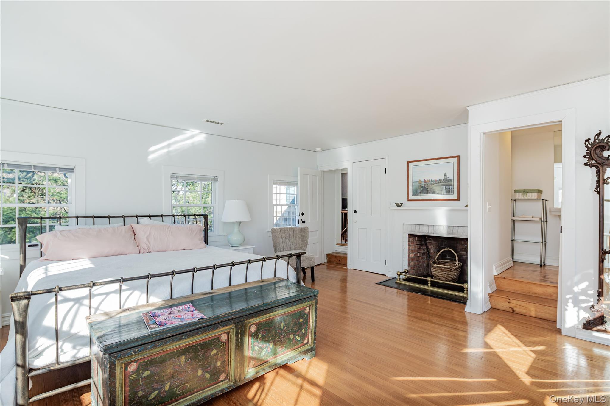 78 Mecox Road Water Mill, NY 11976 - Photo 29 of 41 a living room with furniture a fireplace and a flat screen tv
