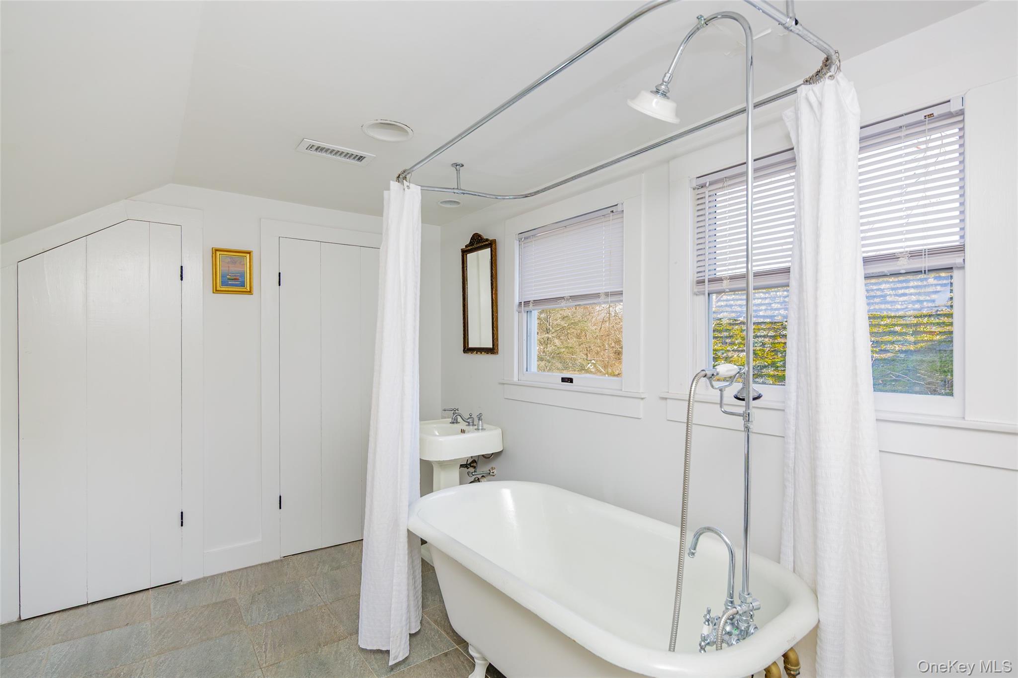 78 Mecox Road Water Mill, NY 11976 - Photo 34 of 41 a bathroom with a tub and shower