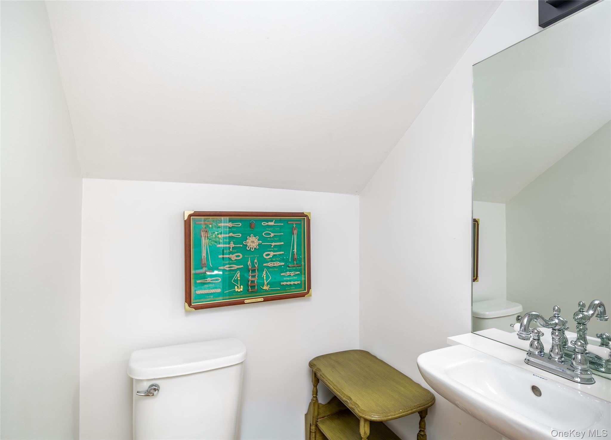 78 Mecox Road Water Mill, NY 11976 - Photo 36 of 41 a bathroom with a sink a toilet and mirror