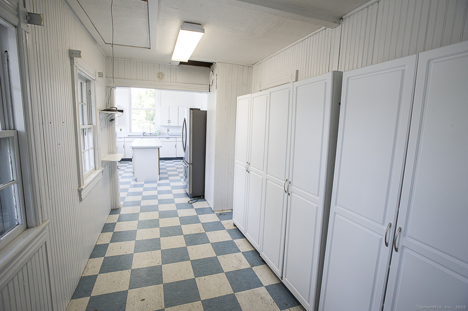 685 Kent Road New Milford, CT 06755 - Photo 18 of 34 a bathroom with a black and white checkered floor