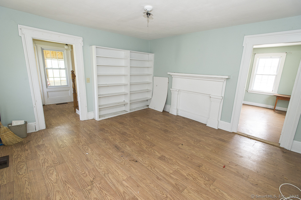 685 Kent Road New Milford, CT 06755 - Photo 29 of 34 a view of empty room with wooden floor and fan