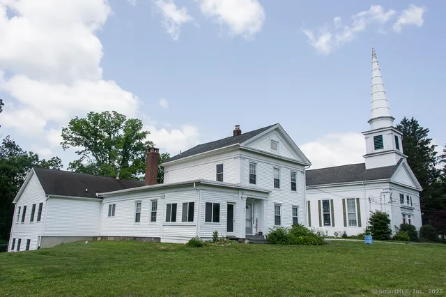 a view of a house with a garden